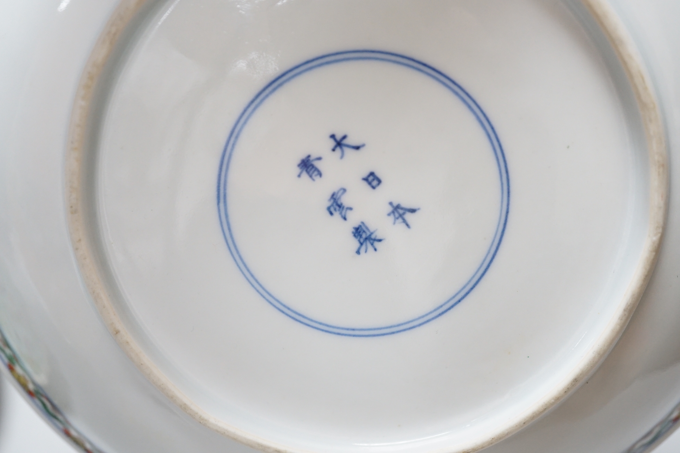 A Chinese famille rose plate, a cantonese plate and a blue and white crackle glaze jar